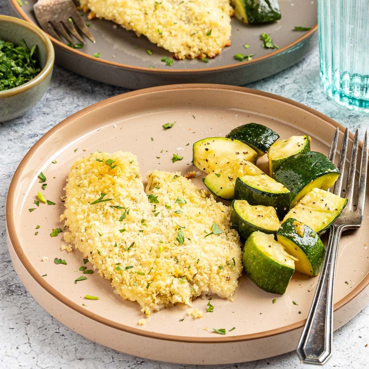 Taste of Home Baked Tilapia with Panko Bread Crumbs photo of the finished recipe served on plates.